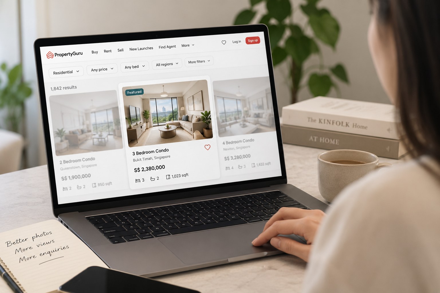 A laptop displaying a property listing on a property portal, next to notes on maximising views and enquiries
