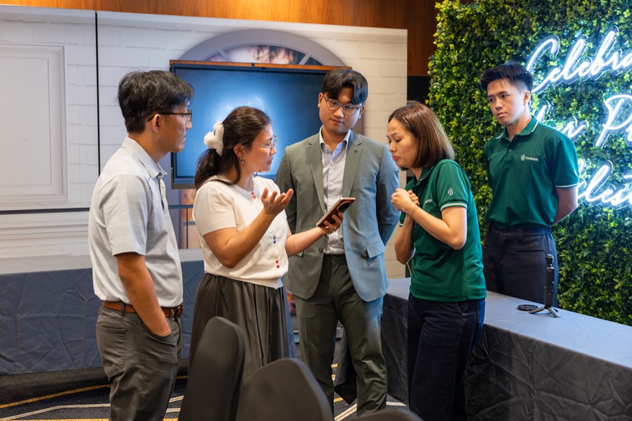 Crestbrick team members gathered with clients after a session