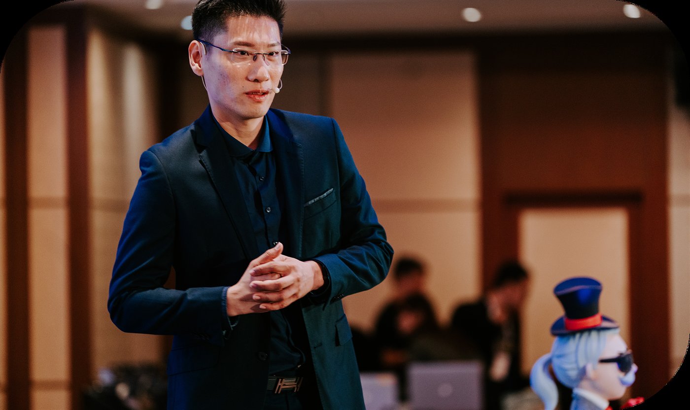 A Crestbrick team member presenting to an audience at a company event