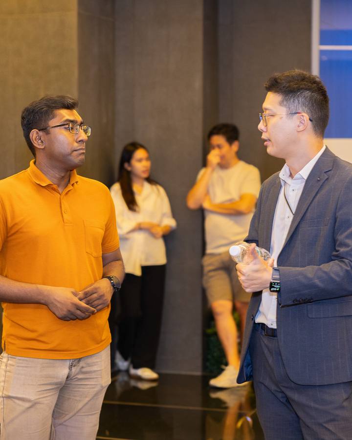 Crestbrick realtors in conversation with guests at an event