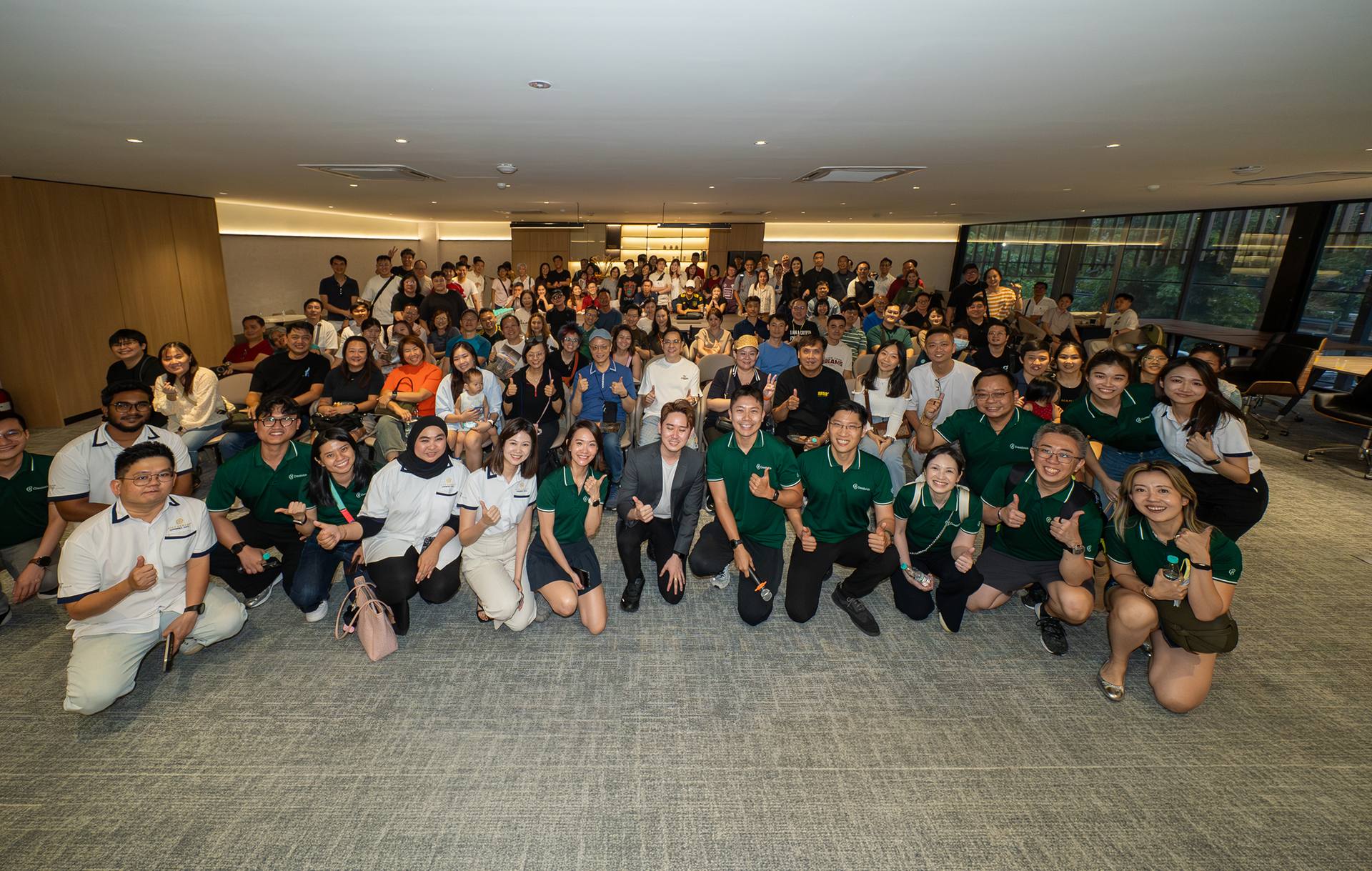 The Crestbrick team and guests posing together after a company event